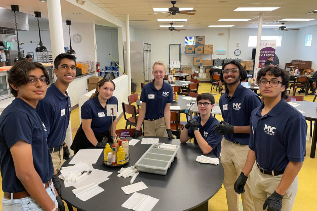 Students in a volunteer setting